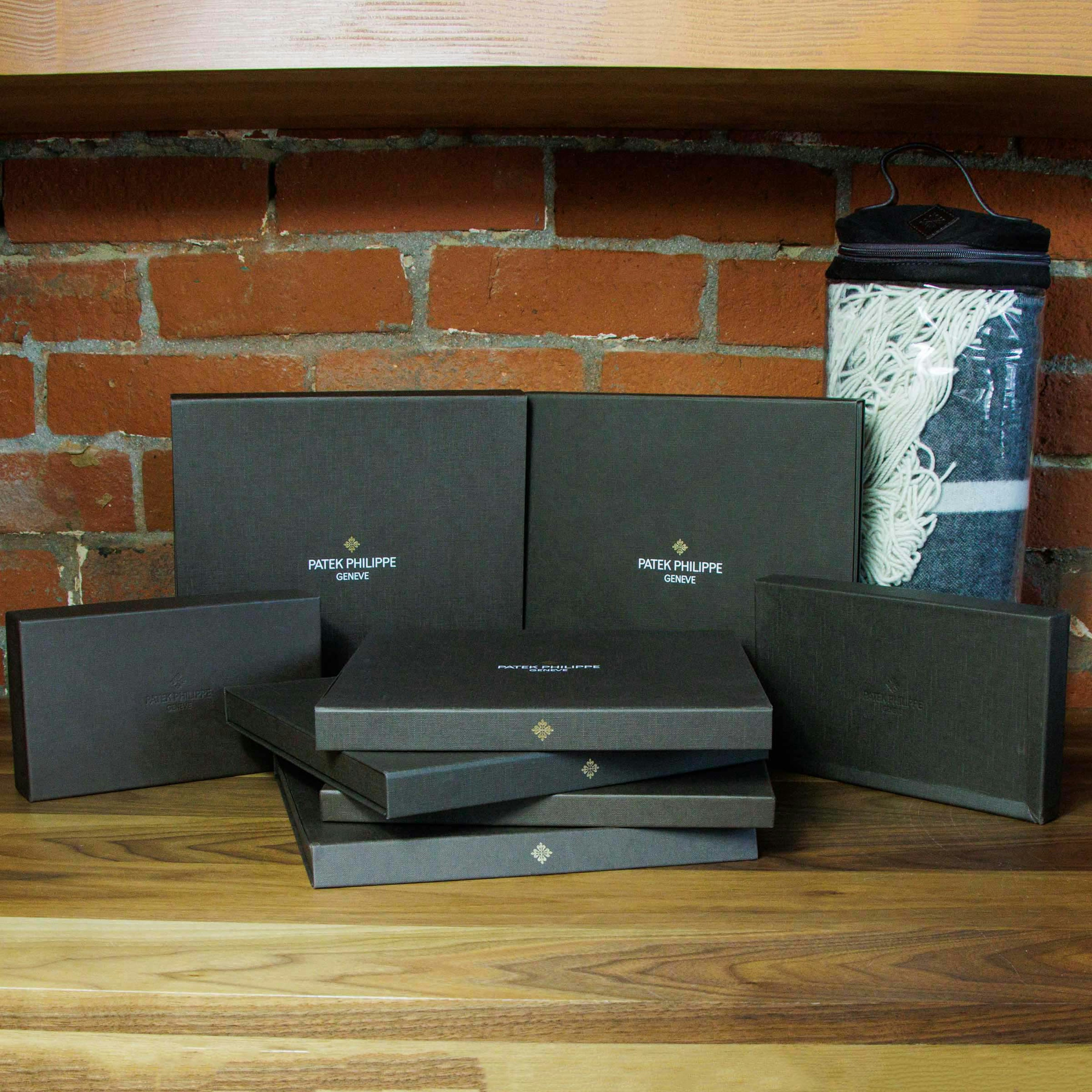 Patek Philippe Lot of Six Silk Scarves Two Leather Wallets and Wool