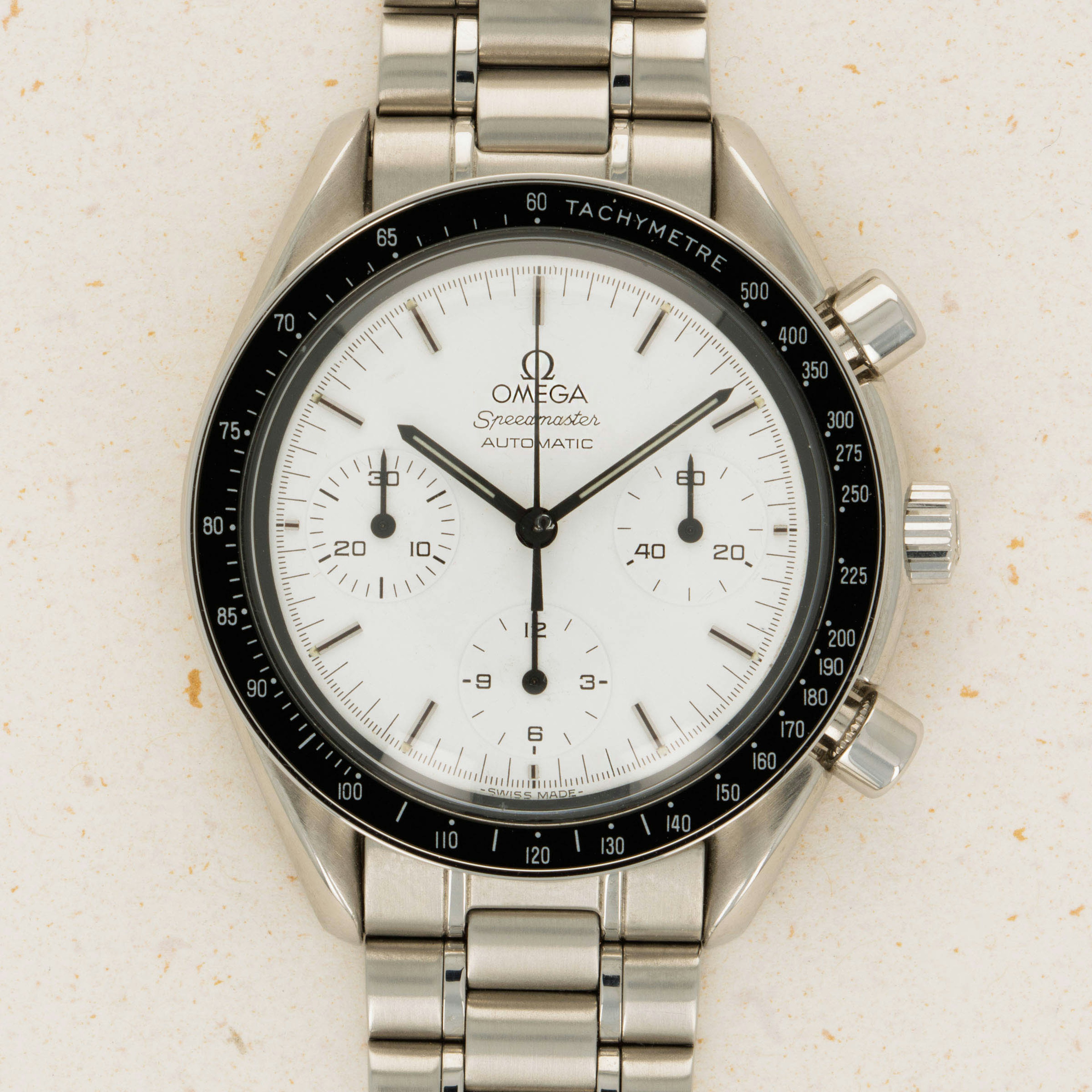 Omega speedmaster automatic white dial best sale